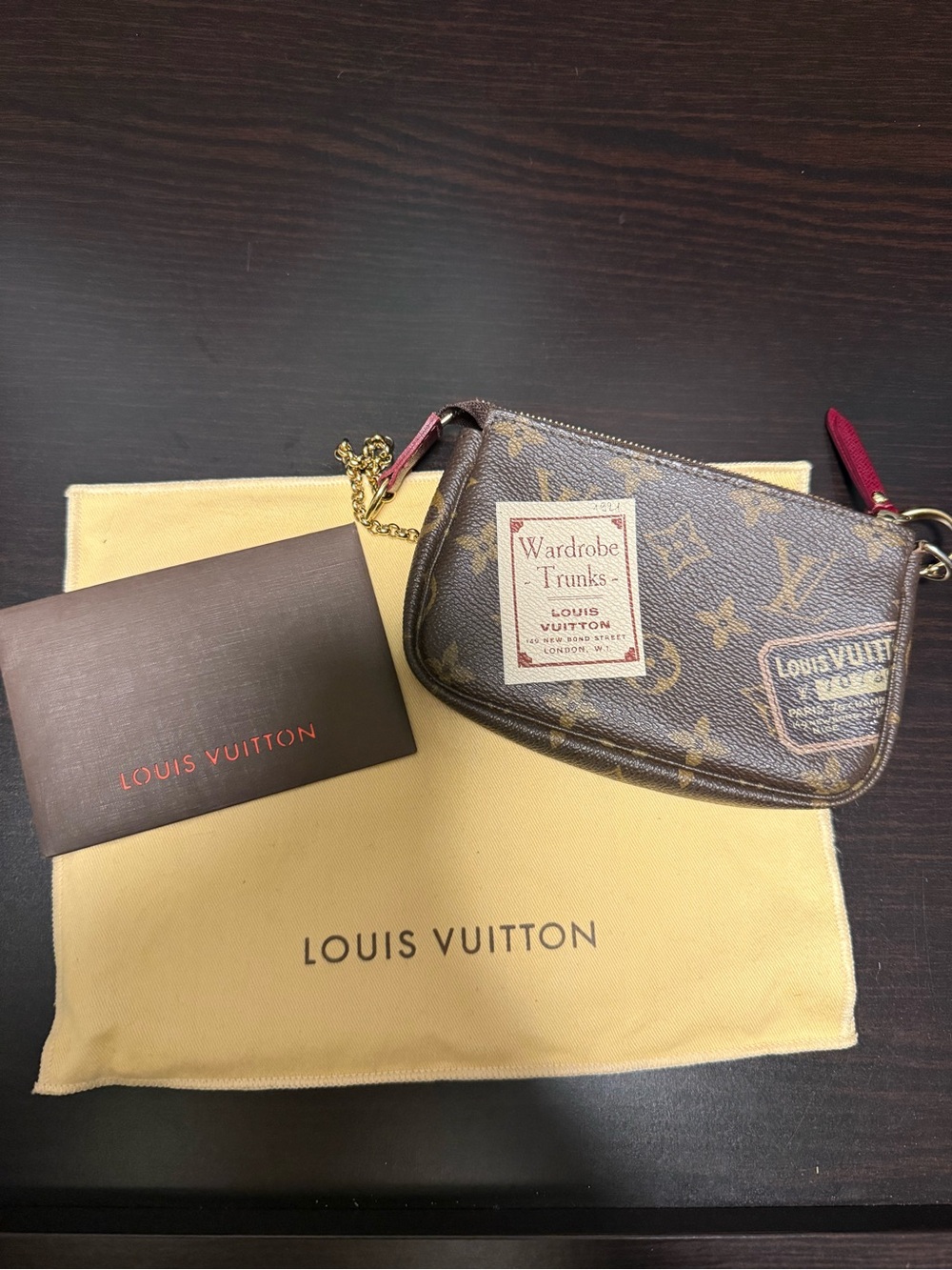 Louis Vuitton Monogram Mini Pochette with Magenta Accent and Gold Hardware